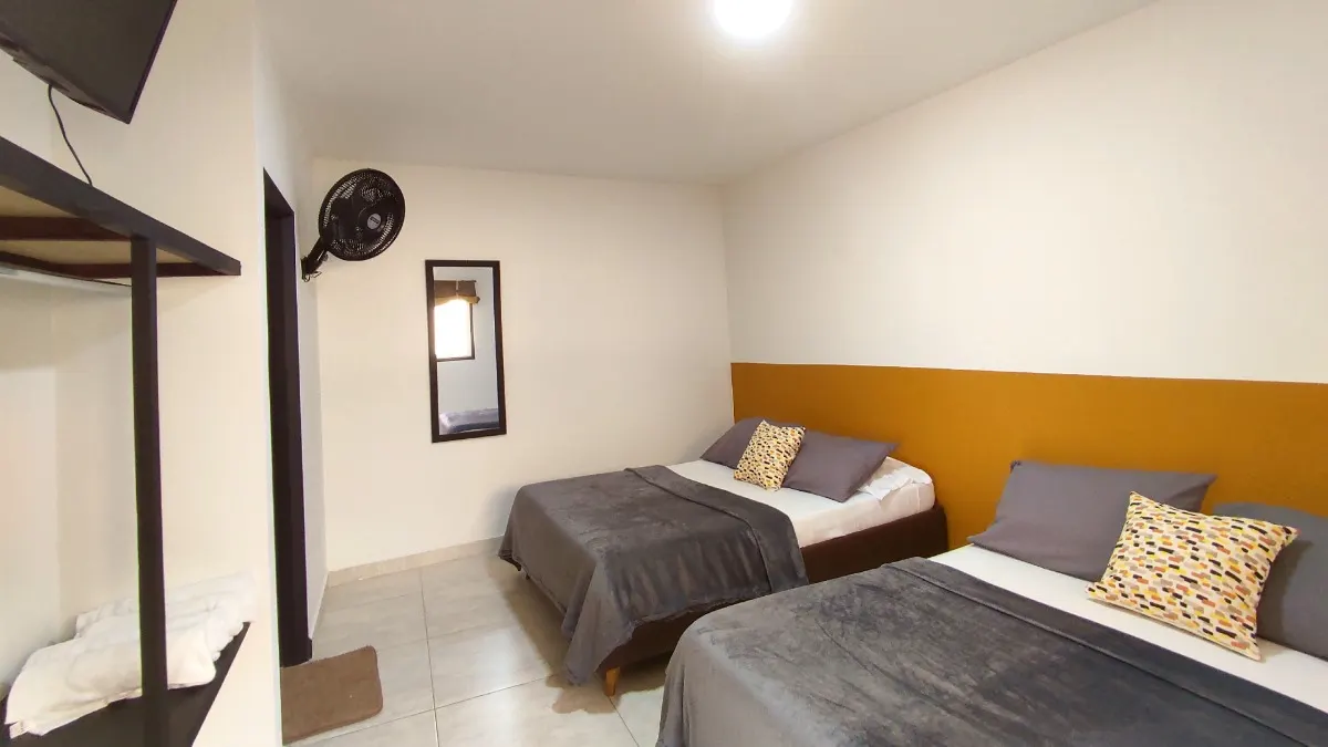 Habitación Twin con dos camas dobles en Trip Monkey Origen